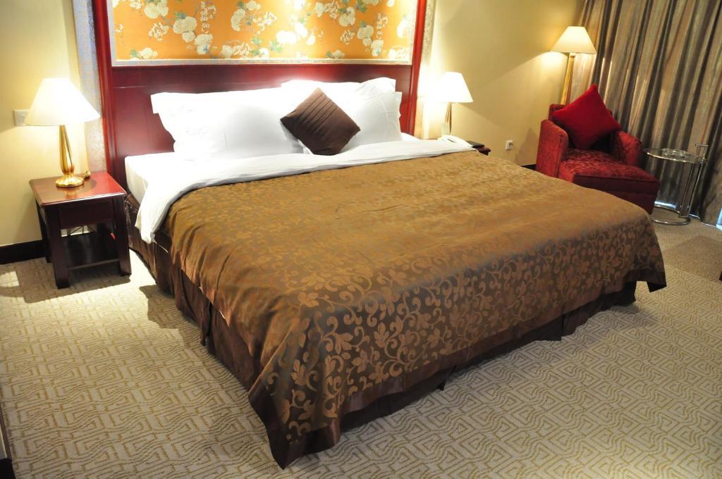 New Cozy Harbour Hotel Нанинг Стая снимка