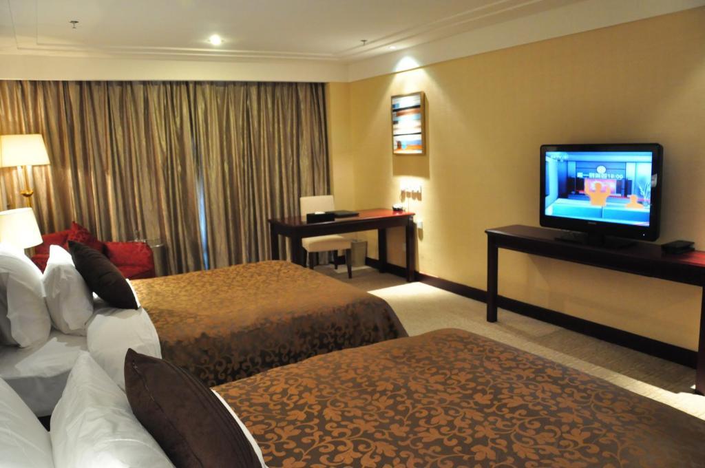New Cozy Harbour Hotel Нанинг Стая снимка