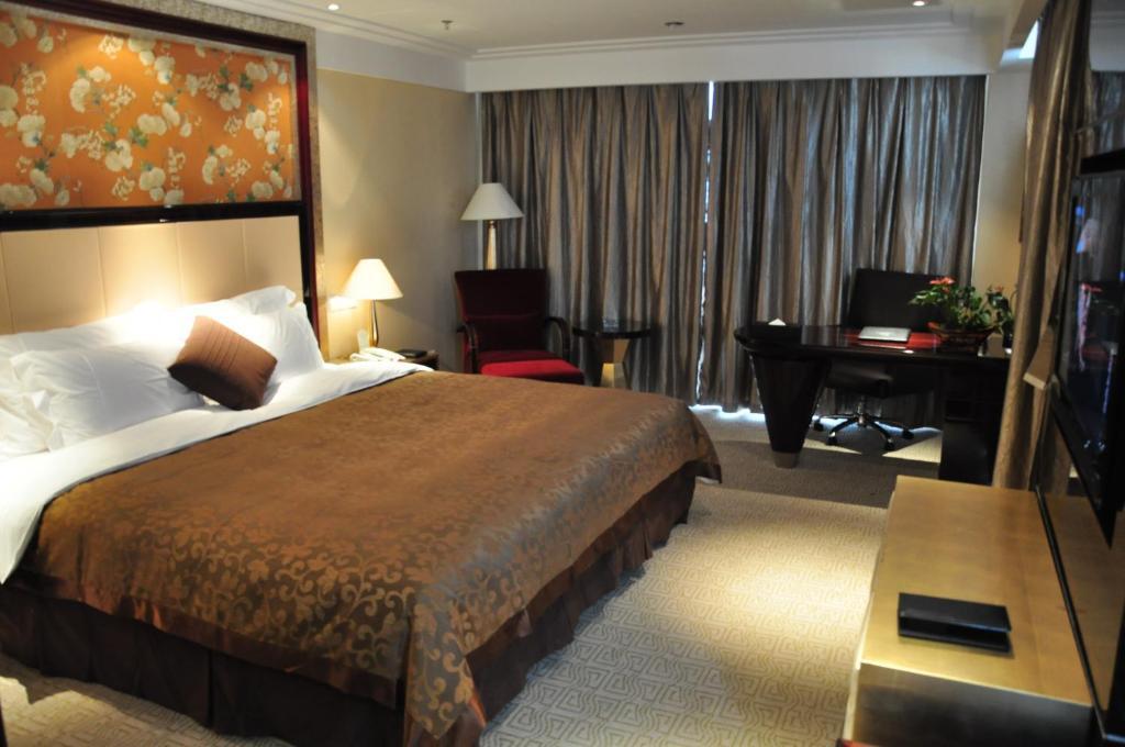 New Cozy Harbour Hotel Нанинг Стая снимка