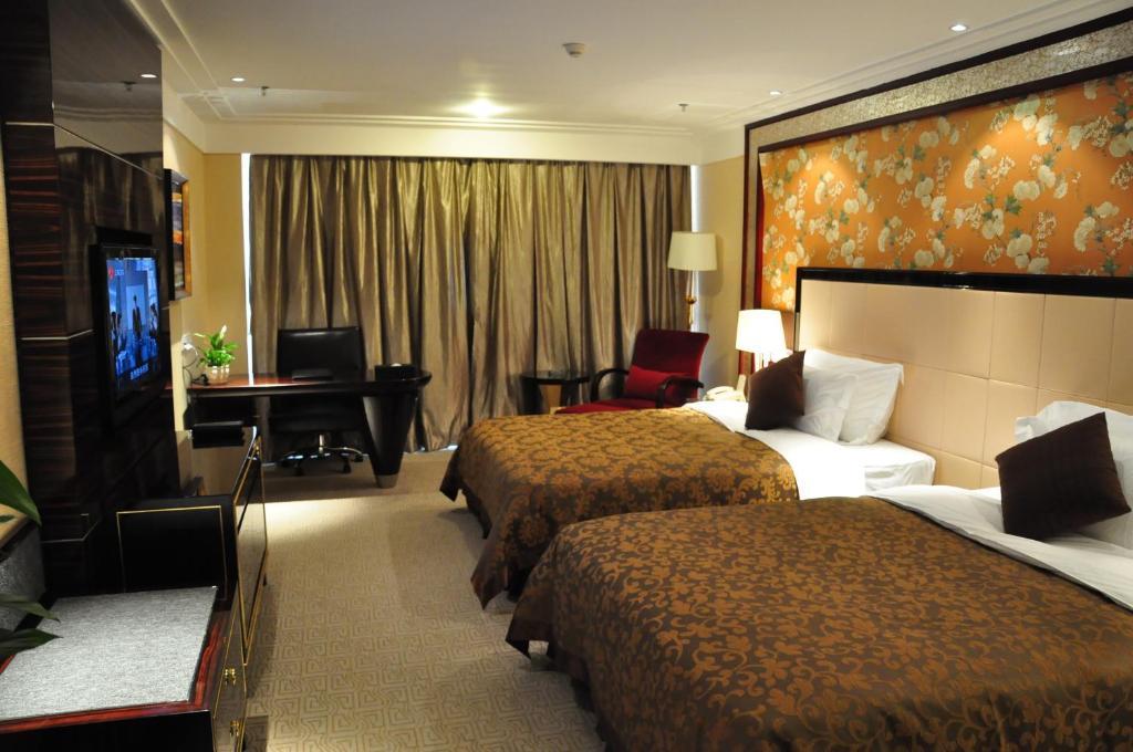New Cozy Harbour Hotel Нанинг Стая снимка
